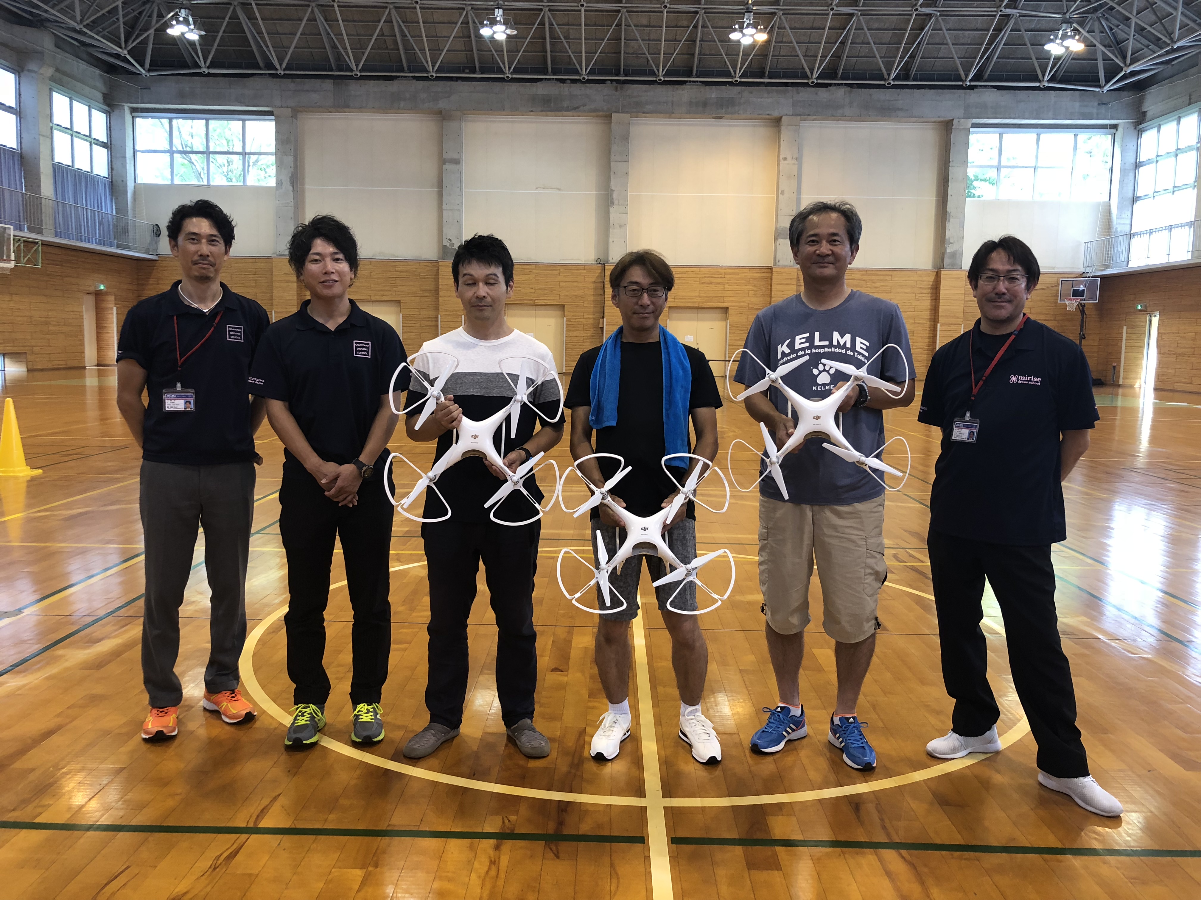 無人航空機操縦技能取得コース修了式後の記念写真